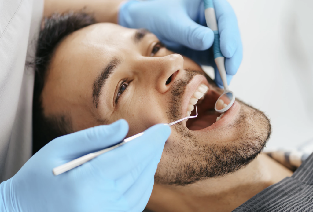 Image showing patient undergoing dental examination for bruxism detection. Apart from this various tests might be required to detect bruxism. 